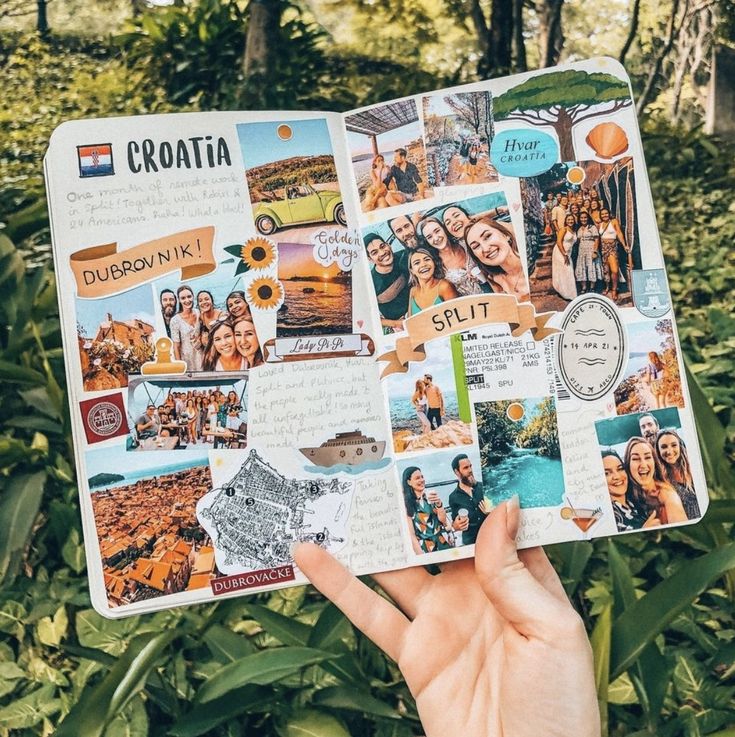 someone holding up a scrapbook with pictures on it in front of some trees and bushes