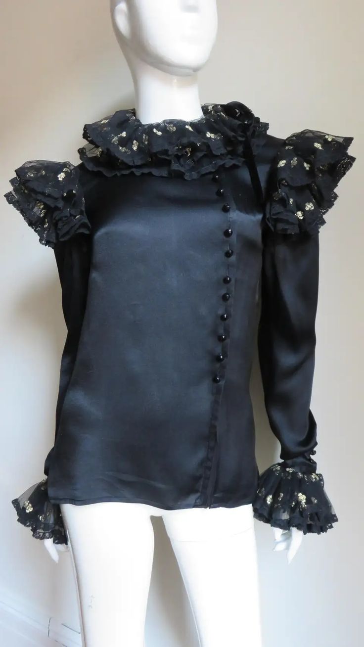 For Sale on 1stDibs - A gorgeous black silk charmeuse blouse shirt blouse by Valentino. It buttons on the side front with delicate faceted black glass buttons and is adorned Luxury Spring Party Blouse, Spring Luxury Party Blouse, Designer Embellished Fitted Blouse, Designer Fitted Embellished Blouse, Luxury Long Sleeve Top With Ruffles, Glamorous Silk Top For Formal Occasions, Designer Evening Tops With Ruffles, Luxury Silk Top For Evening, Designer Ruffled Tops For Evening