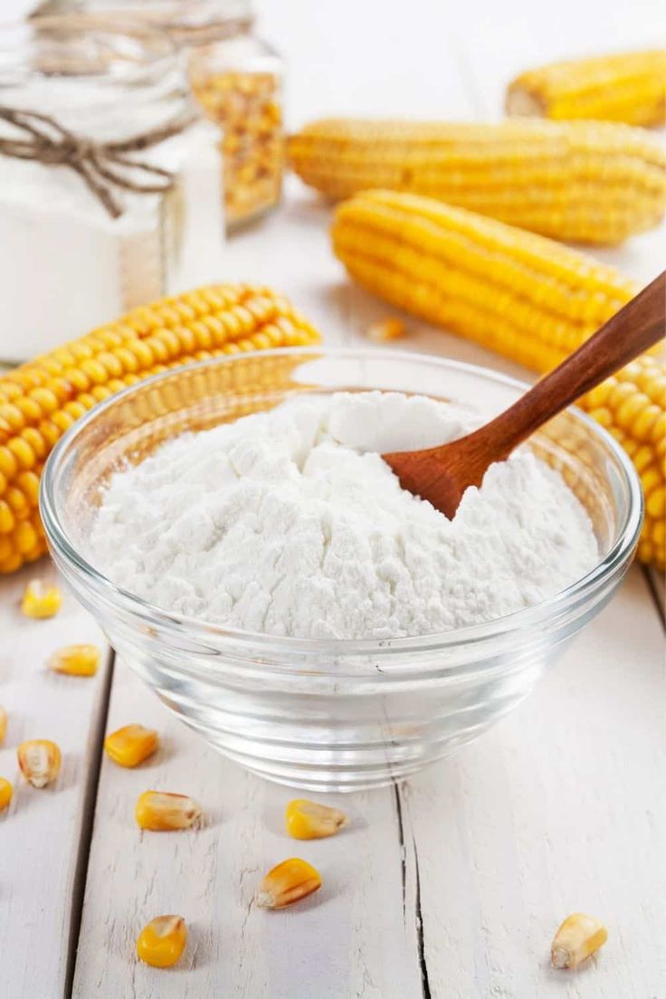 corn on the cob and flour in a glass bowl