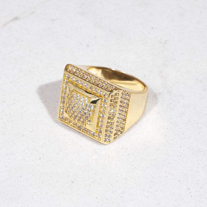 The Gold Square Paved Ring exudes elegance with its intricate design and shimmering allure. Crafted with precision and adorned with delicate pave-set stones, this exquisite piece effortlessly blends sophistication and timeless style, making it a stunning addition to any jewelry collection. Gold Rings With Rhinestones, Sparkling Stones Round Promise Ring, Gold Cluster Ring With Pave Setting, Gold Rhinestone Rings For Anniversary, Rhinestone Open Ring For Promise, Sparkling Stones Promise Ring With Round Cut, Gold Rings With Rhinestones For Anniversary, Gold Diamond Ring With Rhinestones, Gold Diamond Ring With Rhinestones For Anniversary