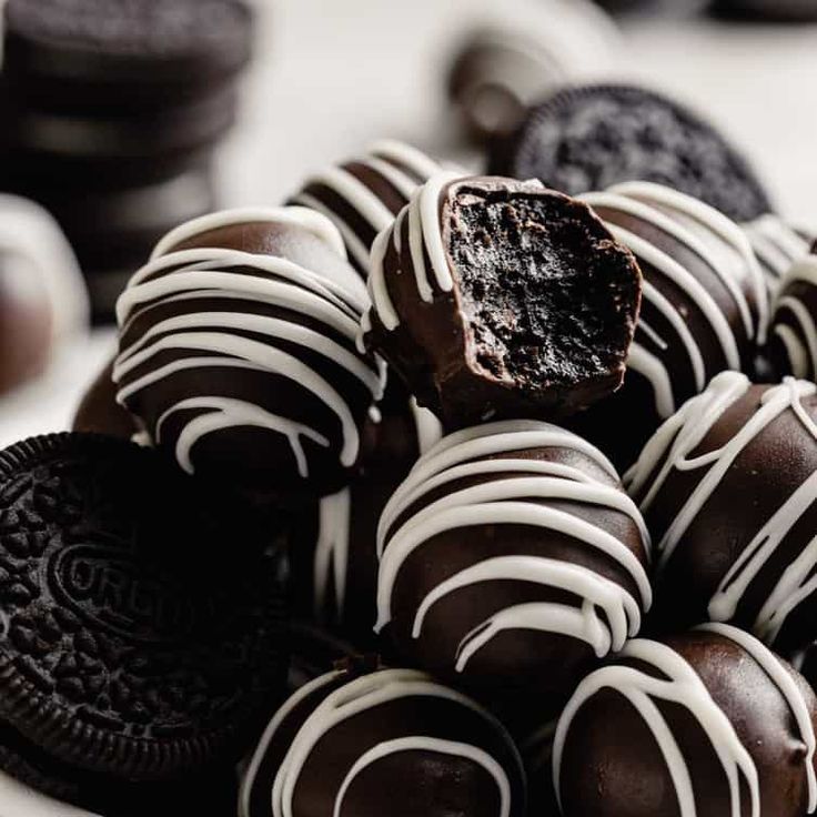 a plate full of oreo cookies and chocolates