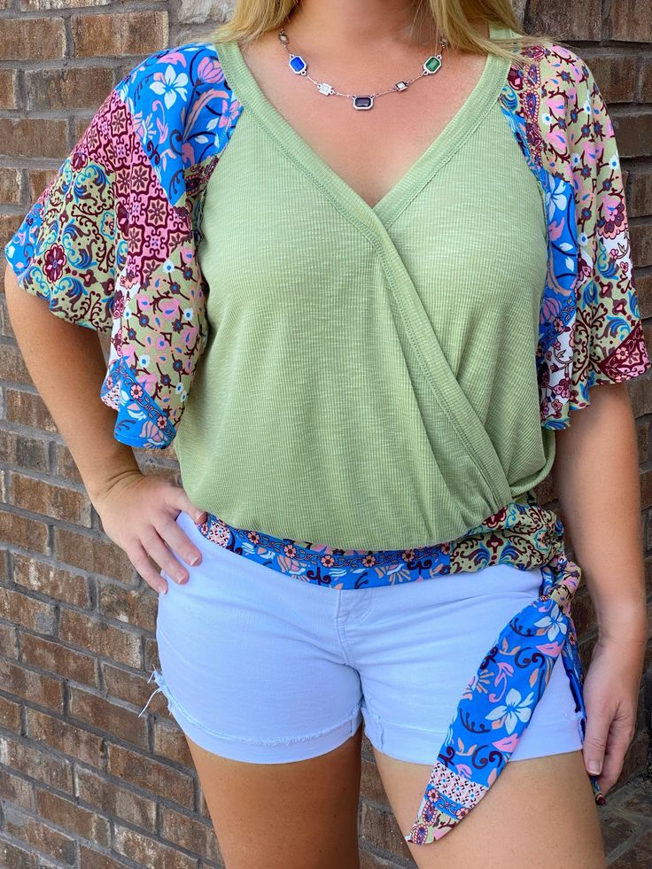 Take a night out with the girls in this open back top. The top is sage with a beautiful blend of colors for the sleeves and bow around waist. Open Back Top, Sage Green, Open Back, The Top, Take A, Night Out, Take That, Thing 1, Green