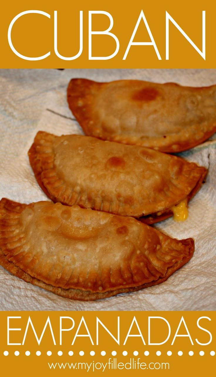 some food that is sitting on top of a paper towel with the words cuban empanadas