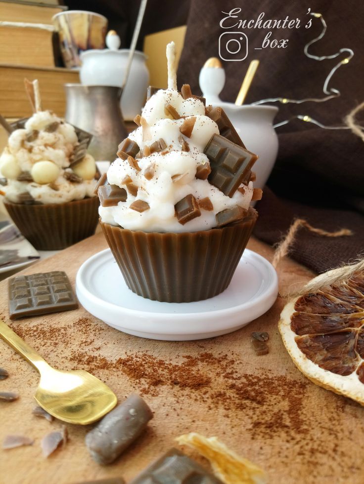 there is a cupcake with chocolate and marshmallows on it