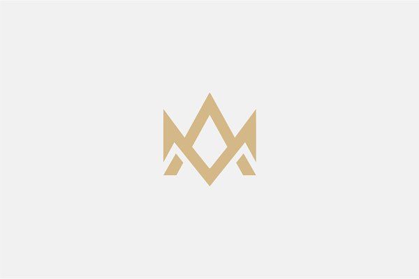 the letter m is made up of two intersecting lines, and it appears to be in gold