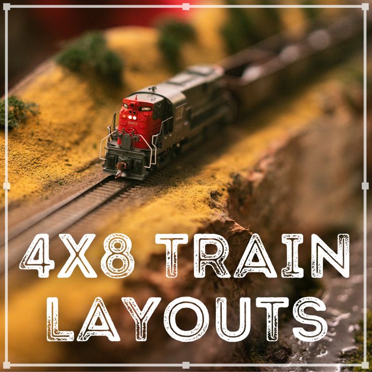 a red train traveling down tracks next to yellow grass and trees with the words 4x8 train layouts