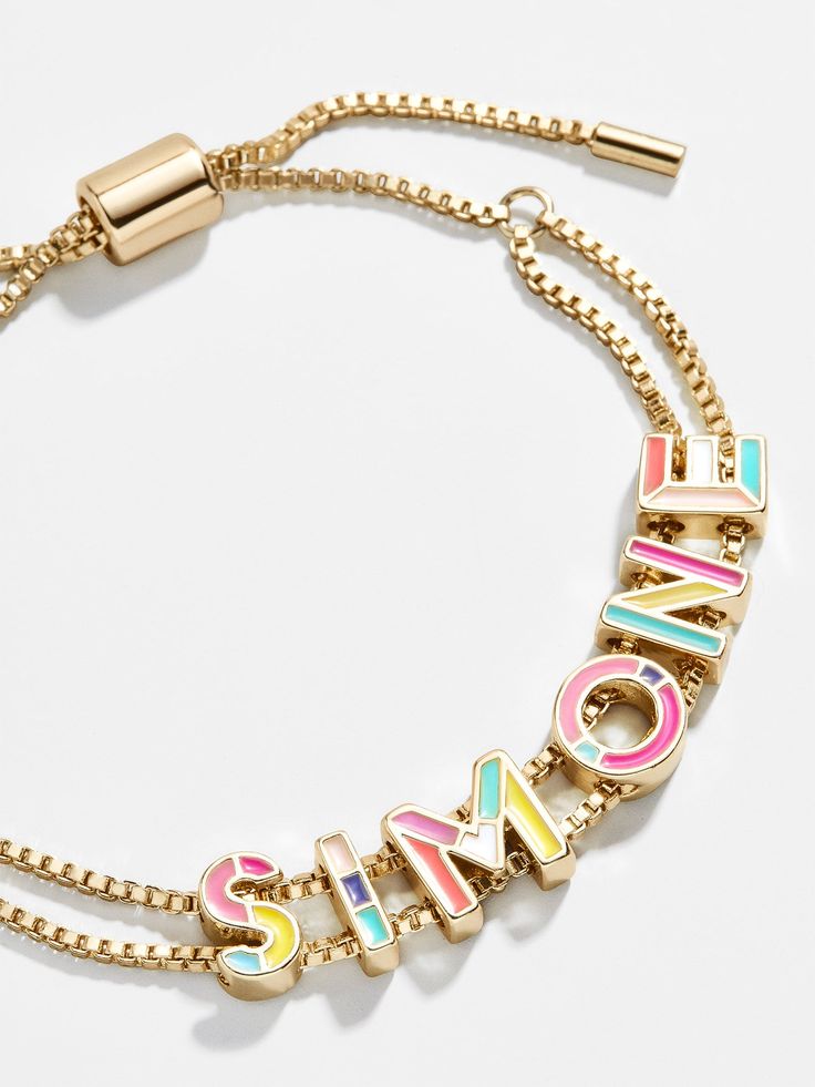 The brightest among our collection of Custom Slider Bracelets is our Multi Enamel style. This special bracelet features two strands of a box chain, an easily adjustable pull-tie closure, and vibrant gold and enamel beads. Choose a name, initials, or favorite phrase to customize your bracelet with - it's sure to be your new everyday staple. See our Letter Key for all options available. Teen Word Bracelets, Cute Custom Christmas Gifts, Best Gifts Christmas, Boss Babe Bracelets, Stackable Name Bracelets, Gifts For B, Preppy Stack Bracelets, Christmas Gifts For Friends Preppy, Cute Name Bracelet