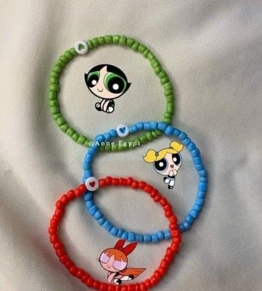 the powerpuff girls bracelets are made from plastic bead and have cartoon characters on them