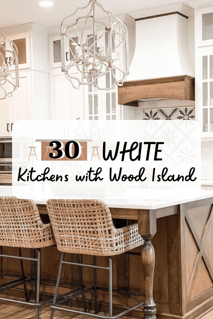 a kitchen with white cabinets and wooden island in the center is surrounded by wicker chairs