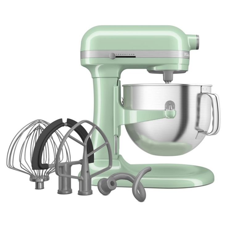 an image of a pink mixer and attachments