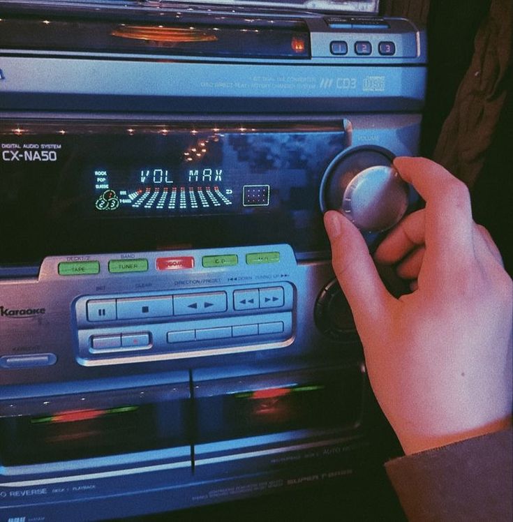 a person is pressing buttons on a radio