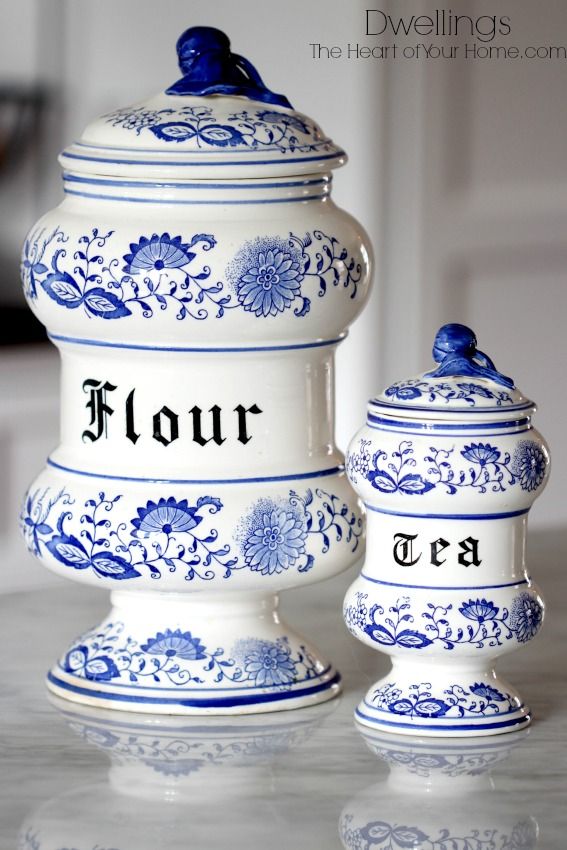 two blue and white dishes sitting on top of a counter