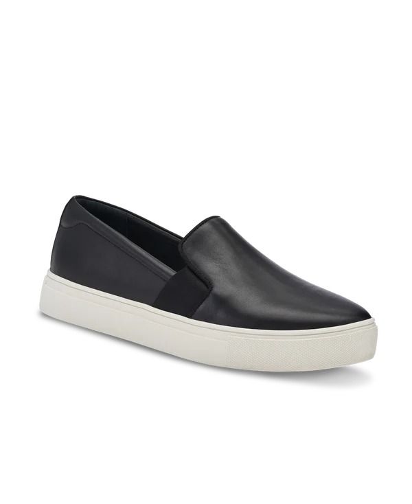 Our sleek and modern black slip-on sneaker is crafted of premium leather. The thick streetwear-inspired sole and streamlined design elevate this everyday sneaker. Back with a new and improved fit, we added an antibacterial shock-absorbing insole, side elastic for extra stretch, and new cotton-canvas lining to amplify c Black Leather Slip-ons With Flat Heel, Comfortable Black Slip-ons With Leather Sole, Functional Synthetic Slip-ons With Round Toe, Black Slip-ons With Removable Insole, Casual Black Slip-on Sneakers With Contrast Sole, Sporty Leather Slip-ons With Vulcanized Sole, Modern Textured Sole Slip-ons For Streetwear, Comfortable Leather Slip-ons With Cushioned Footbed, Casual Leather Slip-ons With Textured Sole