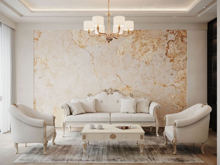 a living room with marble walls and white furniture