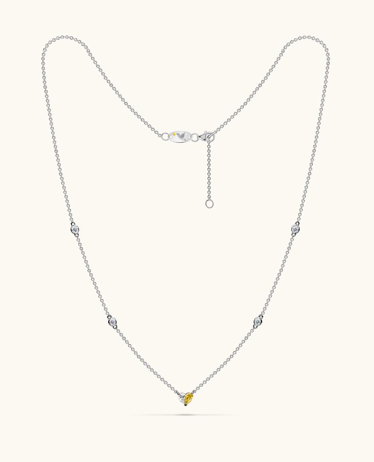 Introducing Paloma's iconic Heart necklace, a unique design that beautifully spotlights a fancy yellow diamond perfectly paired with a glistening white diamond, forming a flawless heart motif. The chain is adorned with diamonds by the yard, creating a radiant sparkle from every angle. Luxury Yellow Necklaces For Anniversary, Diamond Heart Pendant Necklace With Delicate Chain, Yellow Diamond Jewelry With Single Cut Diamonds, Yellow Diamond Necklace For Anniversary, Elegant Yellow Necklace With Delicate Chain, Formal Yellow Diamond Necklace, Yellow Diamond Fine Jewelry Necklace, Fine Jewelry Yellow Diamond Necklace, Yellow Diamond-cut Necklace In Fine Jewelry Style