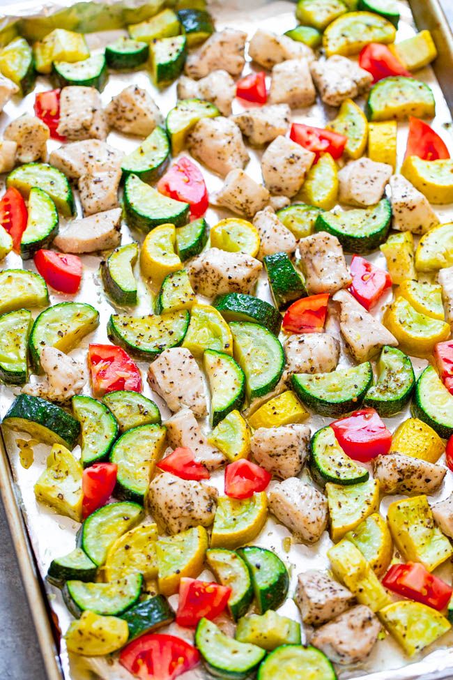 a sheet pan filled with chicken and veggies