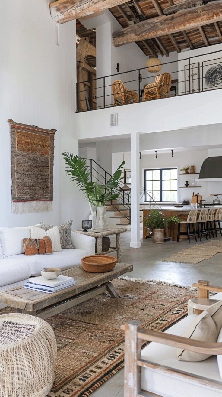 a living room filled with lots of furniture and decor