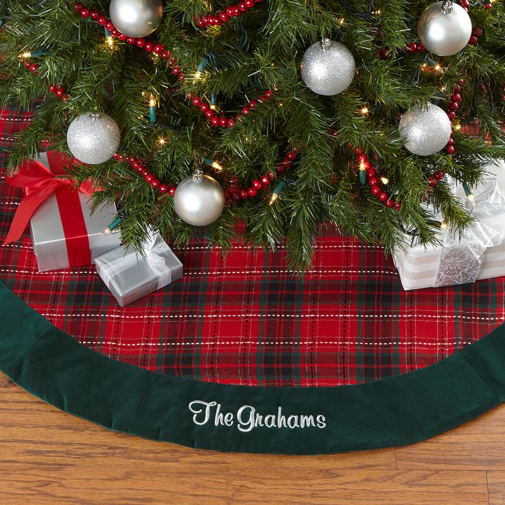 a christmas tree skirt with presents under it