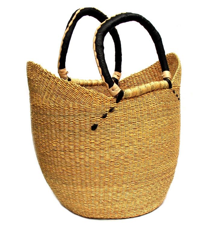 The U- shopper basket is the perfect tote, beach bag, shopper, everyday bag, or home decor basket. | The U- shopper basket is the perfect tote, beach bag, shopper, everyday bag, or home decor basket. The beautiful bolga baskets are hand- woven in small villages of Ghana, a tradition passed down from generation to generation. They are woven out of renewable resources, including banana leaf and elephant grass, which grow abundantly in the region. Each basket is hand woven and 100% unique! Colors w Large Capacity Bucket Beach Bag For Shopping, Natural Large Capacity Bucket Bag For Shopping, Woven Bucket Straw Bag For Shopping, Bucket Beach Bag With Rolled Handles, Beach Tote Bag With Rolled Handles For Shopping, Casual Basket-shaped Bucket Bag For Shopping, Shopping Beach Tote With Rolled Handles, Casual Natural Fiber Bag With Rolled Handles, Casual Bucket Straw Bag With Rolled Handles