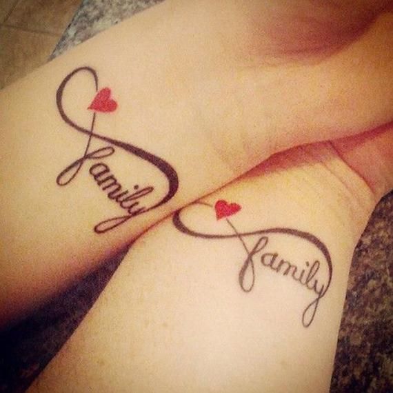 two people with tattoos on their feet that say family and hearts in the shape of letters