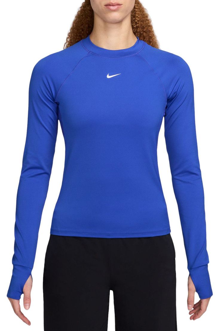 Ready to turn up the heat on your workout? Reach for this fitted long-sleeve top. Thumbholes help keep the sleeves in place through your entire routine. Lightweight and stretchy, the smooth fabric dries quickly and works with you through every move. Mesh panels under the arms let moisture escape so that finishing strong is no sweat. Fit & Design: Fitted Lightweight and stretchy fabric Mesh panels under the arms help increase airflow Thumbholes help keep sleeves in place Nike Dri-FIT technology moves sweat away from your skin for quicker evaporation, helping you stay dry and comfortable Functional Nike High Stretch Tops, Nike Functional High Stretch Tops, Stretch Long Sleeve Tops For Training, Compression Running Tops With Thumbholes, Fitted Long Sleeve Sporty Top, Fitted Long Sleeve Athleisure Top, Nike Fitted Top For Gym, Fitted Nike Top For Gym, Stretch Long Sleeve Rash Guard