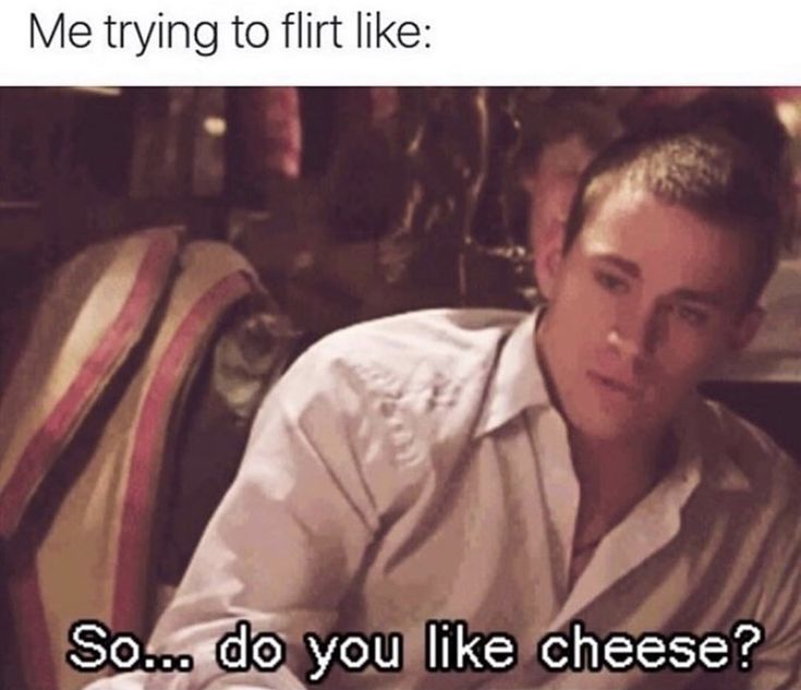 a man sitting in front of a table with food on it and the caption reads, me trying to flirt like so do you like cheese?