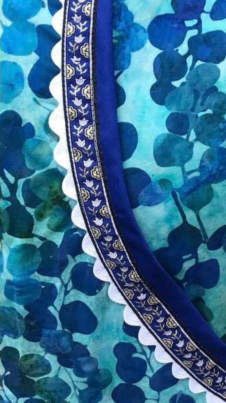 blue and white fabric with flowers on it