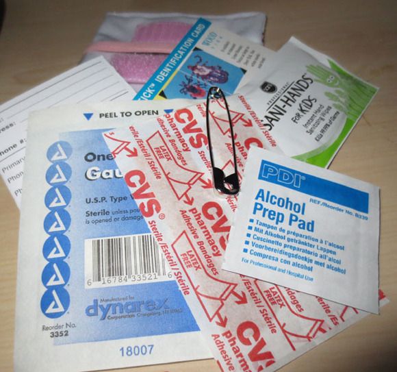 several coupons are stacked on top of each other, including one for alcohol and the other for gas