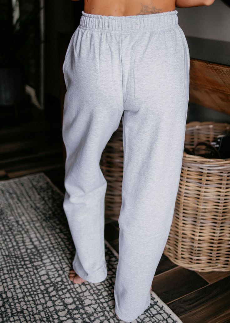 Crafted from high-quality fleece, these joggers feature a drawstring waistband, side pockets, and a soft interior for maximum warmth. For a full matching set pair with the matching Essential Hoodie by Lily & Lottie! Fits oversized. Laurie: prefers a size small. Loghin: prefers a size XL. Brittany: prefers a size small. Madison: prefers a size small. Kaylee: prefers a size 2XL. Materials: 93% Cotton 7% Polyester Measurements: Small: Waist: 25" | Inseam: 27" | Rise: 11" Medium: Waist: 27" | Inseam Essential Hoodie, Graphic Tops, Curvy Dress, Small Waist, Drawstring Waistband, Matching Sets, Dresses For Sale, Heather Grey, Wide Leg