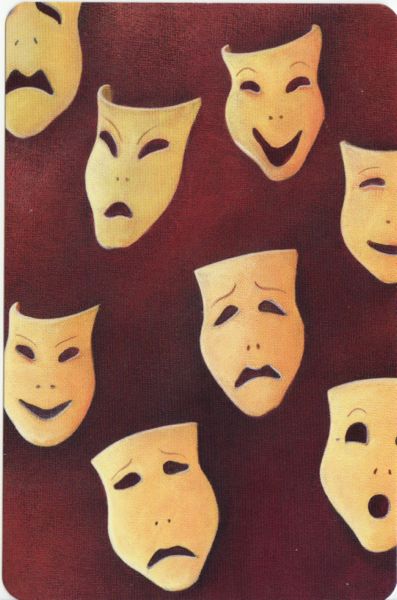 several masks with faces drawn on them