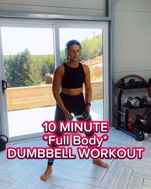 a woman standing in front of an open door with the words 10 minute full body dumbbell workout