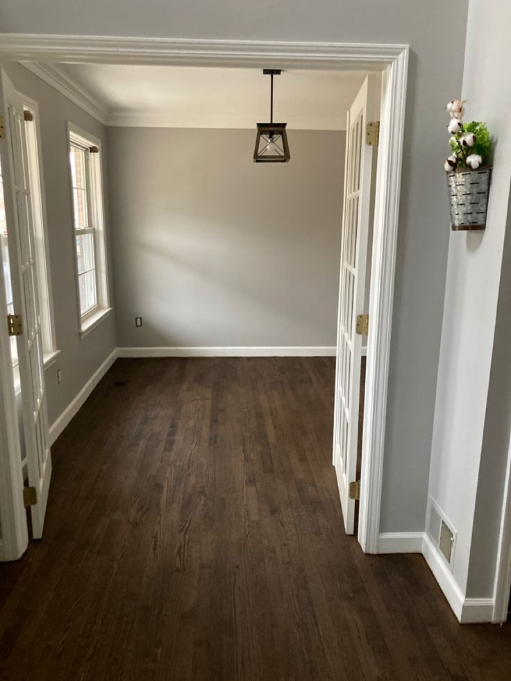 Hardwood Floors Trim Paint Walnut Floor White Walls, Light Gray Walls Dark Floors, Dark Wood Floor Beige Walls, Dark Flooring White Walls, Dark Floor Cream Walls, Dark Wood Floors White Trim, Original Hardwood Floor Stain Colors, Dark Floors Gray Walls, Gray Wall Wood Floor