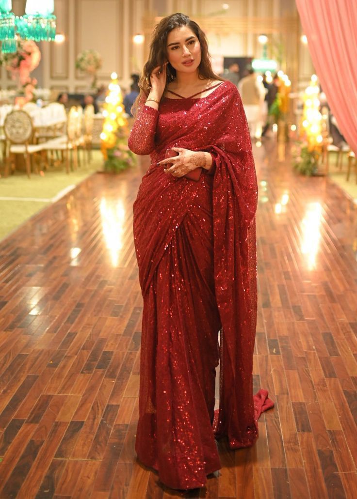 Discover sensational red sarees for party inspiration! From traditional to modern, we've got you covered. Elevate your party style. Subscribe for more fashion ideas! fashion gala, saree, party wear saree, saree collection, latest red saree collection, indian saree collection, red banarasi saree collection, fashion gala #redsaree #red #saree #sarees #sareecollection #sareeblousedesigns #weddingsarees #partwearsaree #chiffonsaree #silksaree #organzasarees #weddingsarees #sareeblouses #fashiongala Maroon Saree Look Modern, Red Net Saree Blouse Design, Red Sari Look, Red Saree Makeup Look, Red Saree Styling, Red Saree For Farewell, Red Saree Outfit, Red Fancy Saree, Red Saree Party Wear