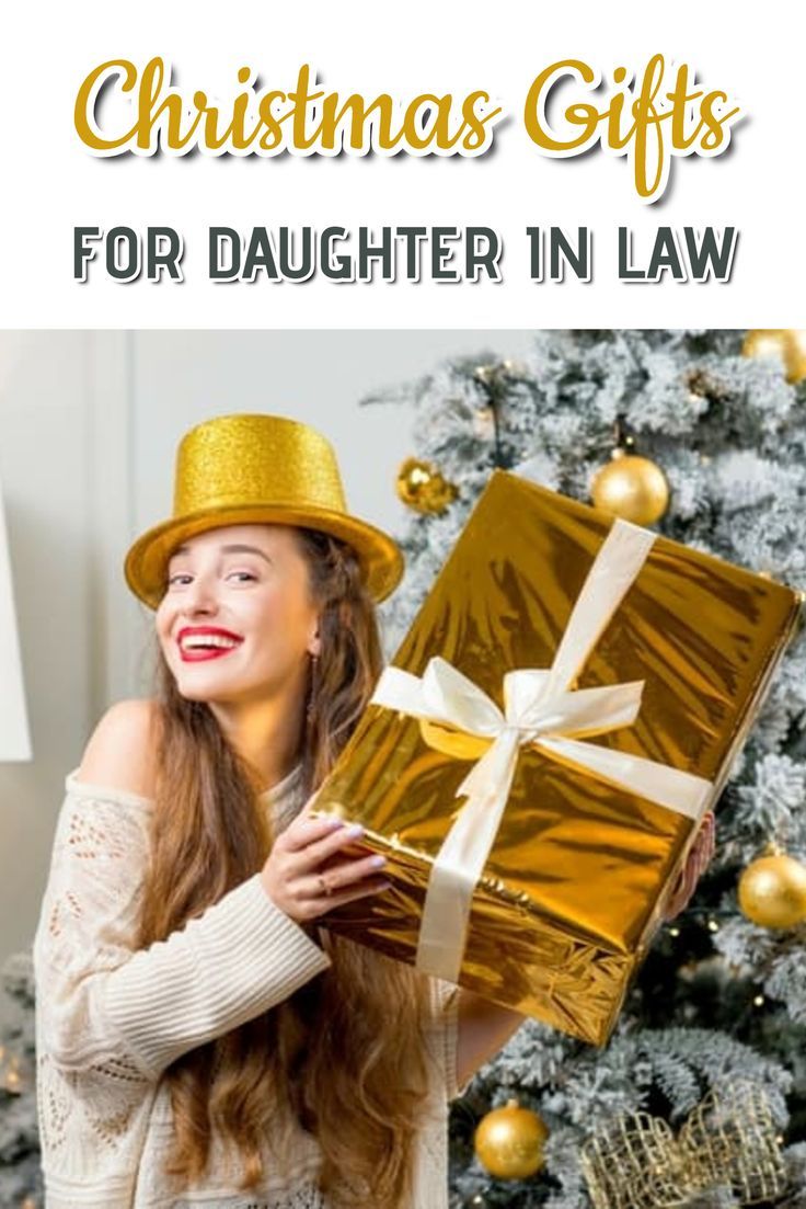 a woman holding a christmas present in front of a christmas tree with the words, christmas gifts for daughter in law