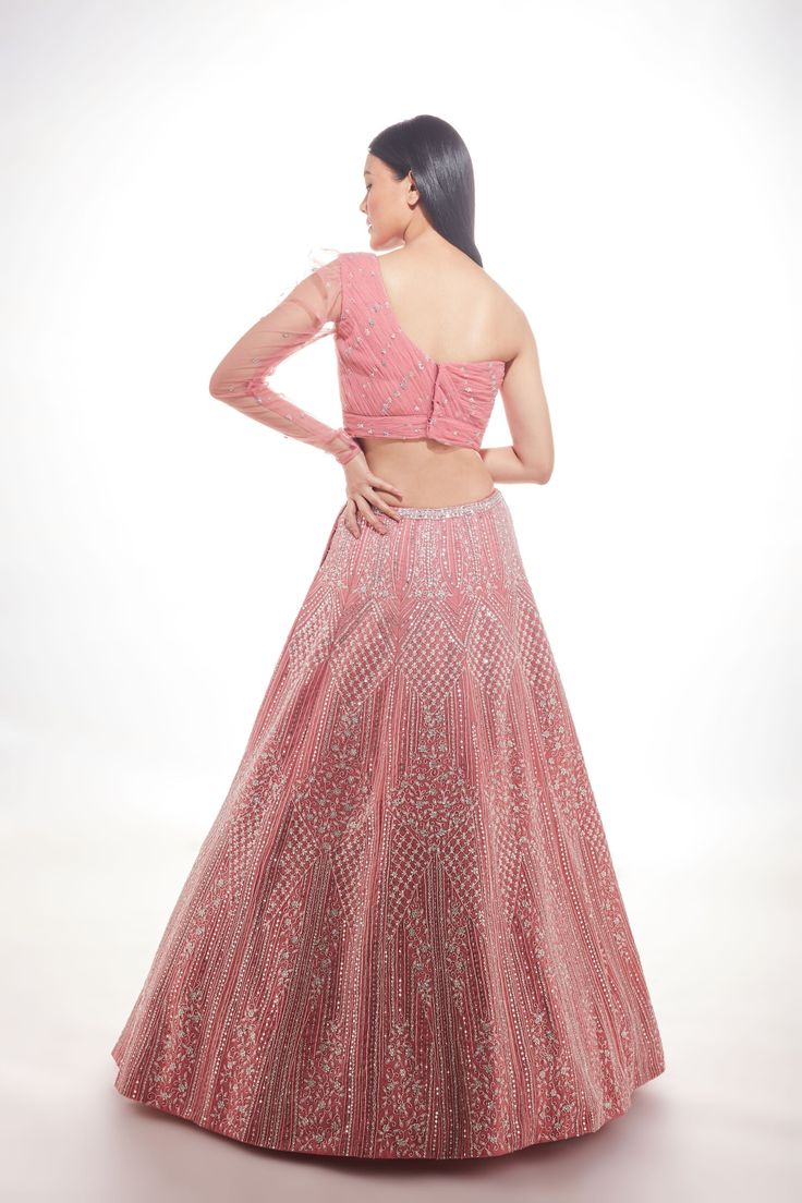 Pink organza lehenga hand embroiderd with fine glass beads and sequence paired with a ruched one-shoulder blouse and net dupatta with tasselsFrom Chamee and Palak 's The Wedding Edit collection DELIVERY TIMEPlease allow 8-12 weeks for your outfit to arrive. FABRIC DETAILSSilk And Net Professional cleaning only. Traditional One-shoulder Set With Dupatta, Traditional One-shoulder Festive Sets, Festive Traditional One-shoulder Set, One Shoulder Dress With Zari Work For Designer Wear, One-shoulder Fitted Saree For Festive Occasions, One Shoulder Sequin Set For Party, Traditional One-shoulder Pre-draped Saree For Reception, One-shoulder Sequin Set For Party, One-shoulder Lehenga For Festive Reception