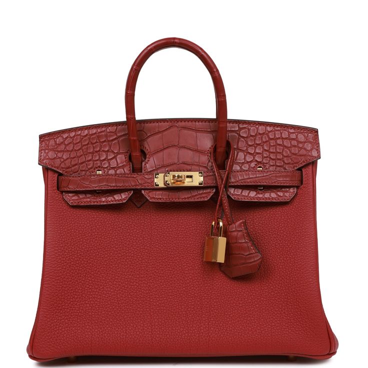 This Birkin is in Rouge Grenat matte Mississippienis alligator and togo leather with gold hardware and has tonal stitching, front strap, two straps with center toggle closure, clochette with lock and two keys and double rolled handles. The interior is lined with Rouge Grenat chevre and has one zip pocket with an Hermes engraved zipper pull and an open pocket on the opposite side. Collection: UOrigin: FranceCondition: Pristine; new or never (Plastic on hardware)Accompanied by: Hermes box, Hermes Dream Bags, Hermes Birkin 25, Hermes Box, Togo Leather, Birkin 25, Hermes Bags, Hermes Birkin, Birkin Bag, Bago