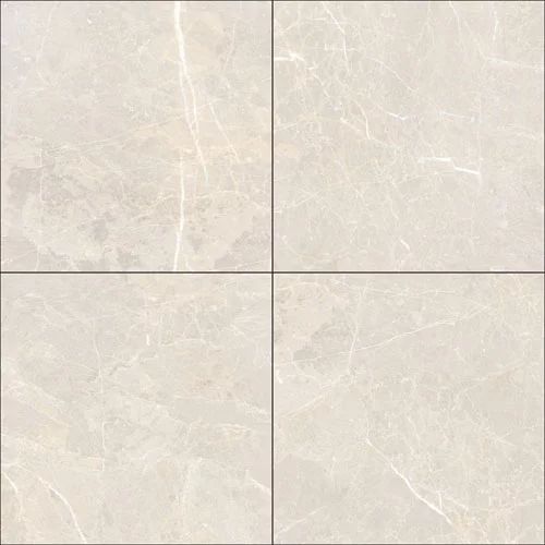 a white marble tile wall with four squares