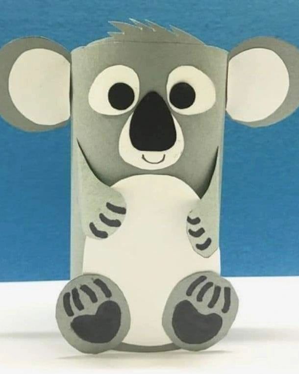 a paper koala bear sitting on top of a table