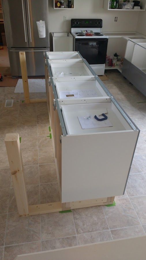 the kitchen counter is being built with drawers