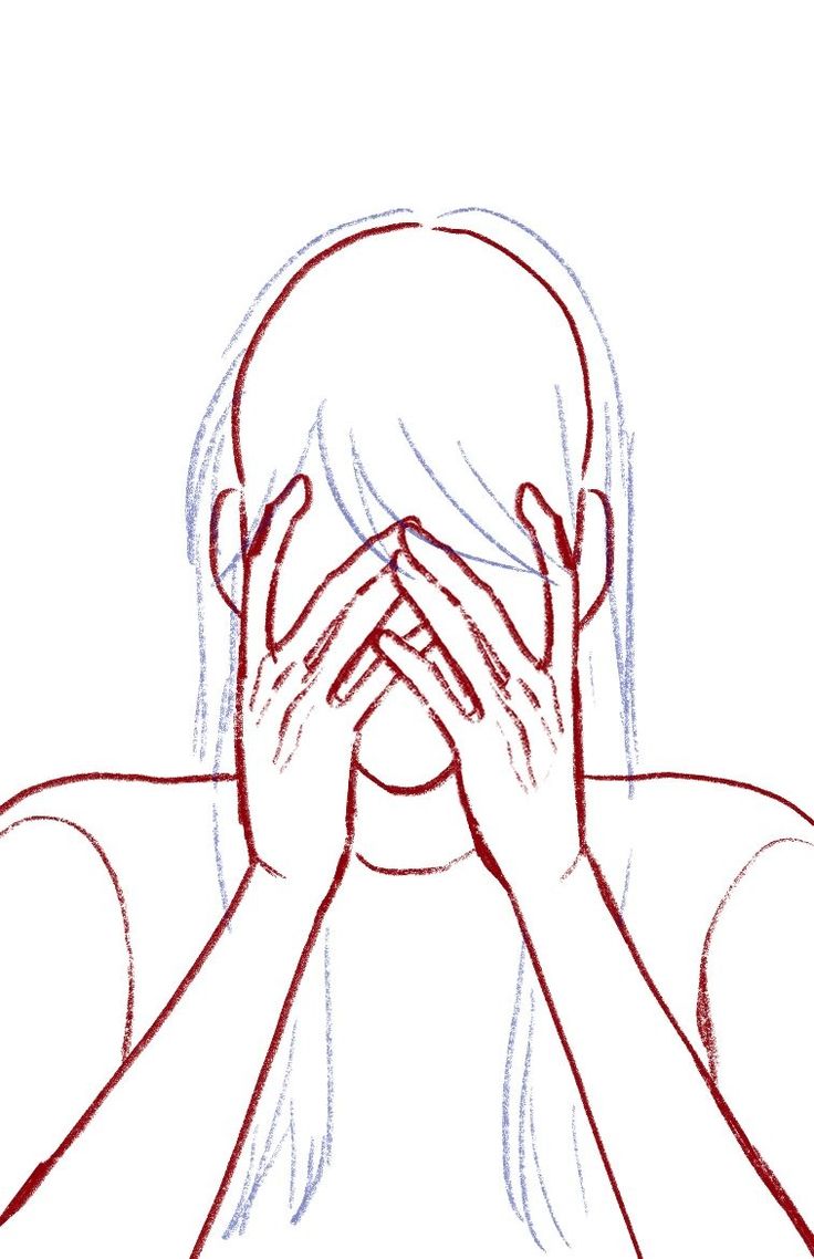 a woman covering her face with both hands