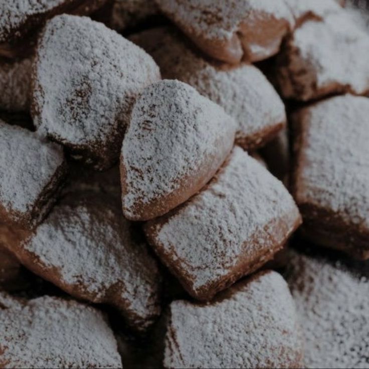 powdered sugar cookies piled on top of each other