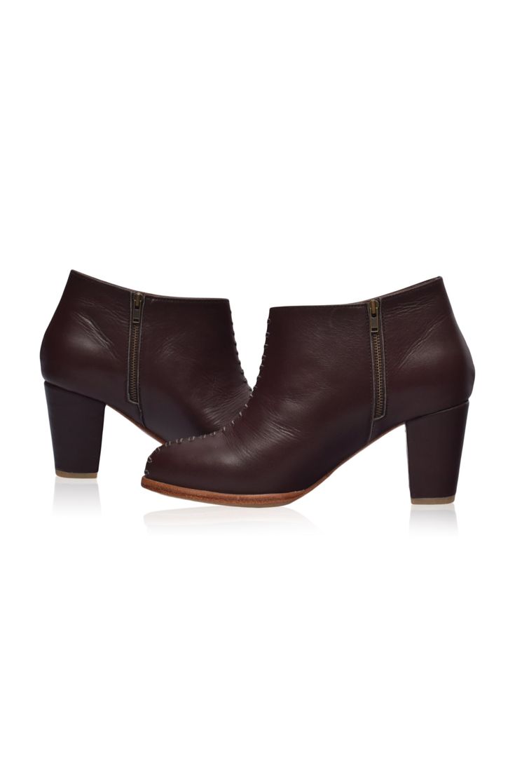 These gorgeous Monte Carlo ankle booties are a must-have in your shoe repertoire. Designed in ankle height silhouette with leather stitch design on the upper and featuring leather-wrapped block heel they are chic, timeless, and comfortable booties that can be worn for any occasion. Style these booties with your maxi or midi dress to elevate your everyday casual style or with your skinny jeans for an urban stylish look. 100% genuine leather Smooth leather lining and insole with embossed logo Ligh Ankle-high Heeled Boots With Stacked Heel For Work, High Heel Booties With Stacked Heel For Work, Workwear High Heel Booties With Stacked Heel, Workwear Ankle Boots With Stacked Heel, Fall Boots With Wrapped Heel, Chic Booties With Stacked Heel For Work, Stacked Heel Booties For Workwear, Medium Width Booties With Stacked Heel For Work, Workwear Booties With Block Reinforced Heel