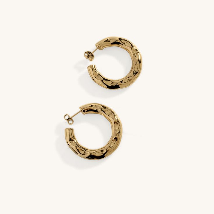 Introducing the Jackie Earrings, designed for timeless elegance. Plated in radiant 18K gold, these earrings add sophistication to any outfit, from formal events to casual outings. With their sleek design, they're the perfect accessory to elevate your style effortlessly. When you're not wearing this piece, tuck it away in your very own Milou jewellery box provided. Stainless Steel, plated with 18K Gold Waterproof (Tarnish Resistant) Natural Linen Milou Jewellery Box Included FREE WORLDWIDE SHIPPI Chic Gold Plated Clip-on Earrings For Formal Occasions, Elegant Tarnish Resistant Metal Clip-on Earrings, Trendy Single Gold-tone Earring, Trendy Gold-tone Single Earring, Chic Gold Tarnish-resistant Huggie Earrings, Elegant Hoop Clip-on Earrings For Anniversary, Elegant Gold-tone Hoop Huggie Earrings, Trendy Gold Tarnish-resistant Earrings, Trendy Small Hoop Yellow Gold Earrings