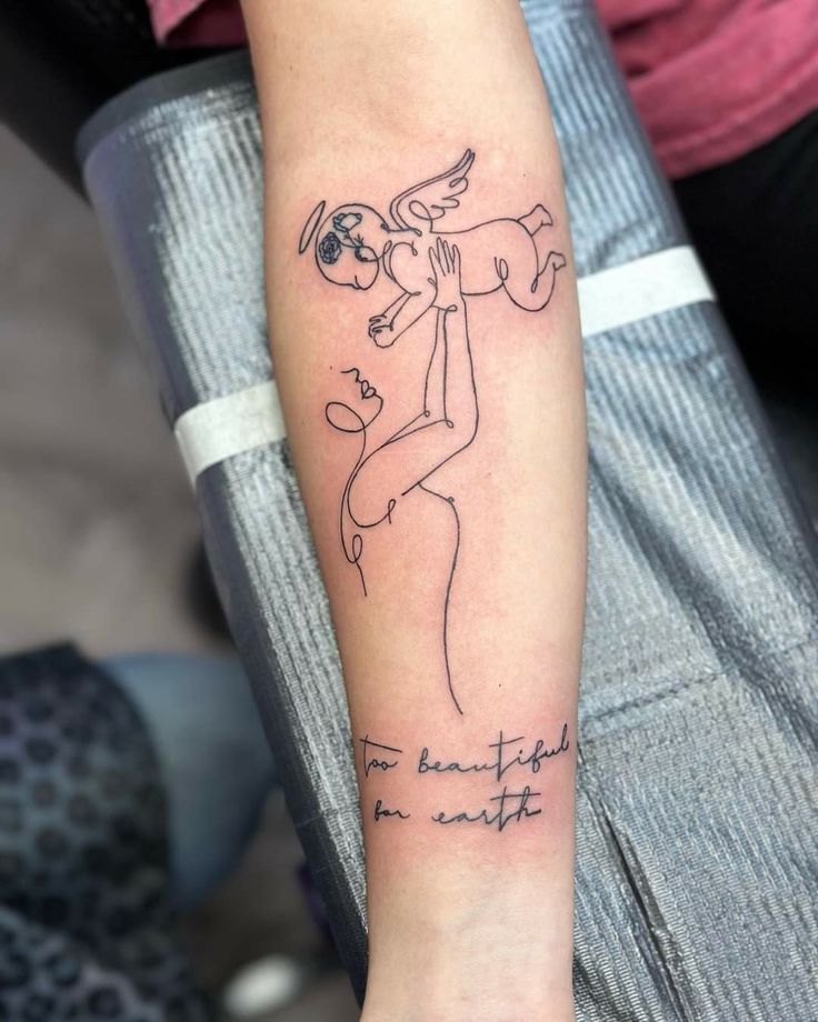 a person with a tattoo on their arm