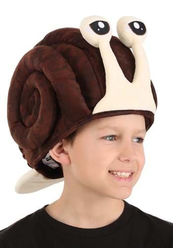 a young boy wearing a snail hat with eyes