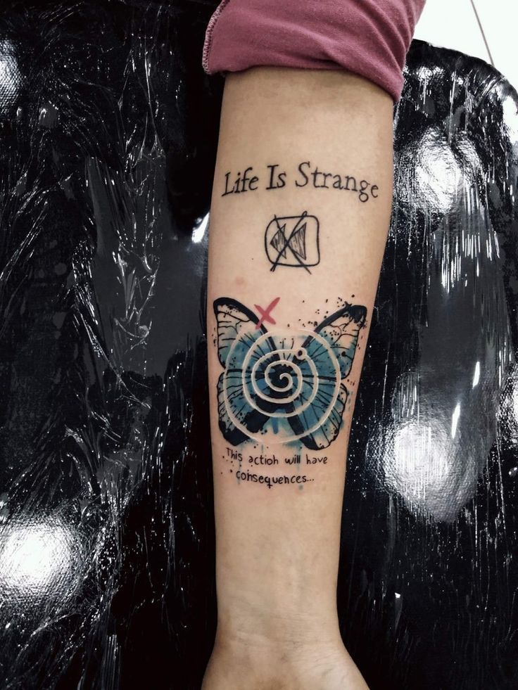 a woman's arm with a butterfly on it and the words life is strange