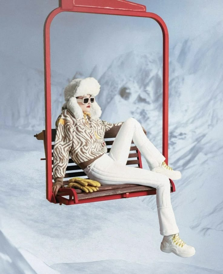 a woman is sitting on a ski lift