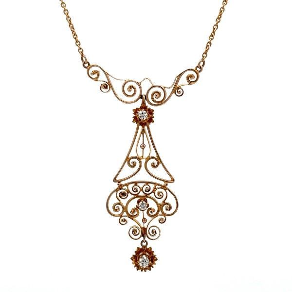 Make a statement with this 14k yellow gold lavalier necklace. It features a stunning old mine cut diamond pendant that adds a touch of vintage charm. Antique Diamond Accent Pendant Necklace, Antique Pendant Necklace With Diamond Accents, Vintage Rose Gold Filigree Necklaces, Vintage Rose Gold Filigree Necklace, Heirloom Pendant Necklace With Intricate Design, Vintage Diamond Necklace In Yellow Gold, Antique Single Cut Diamond Necklaces For Formal Occasions, Ornate Yellow Gold Diamond Necklace, Antique Necklace With Single Cut Diamonds For Formal Events