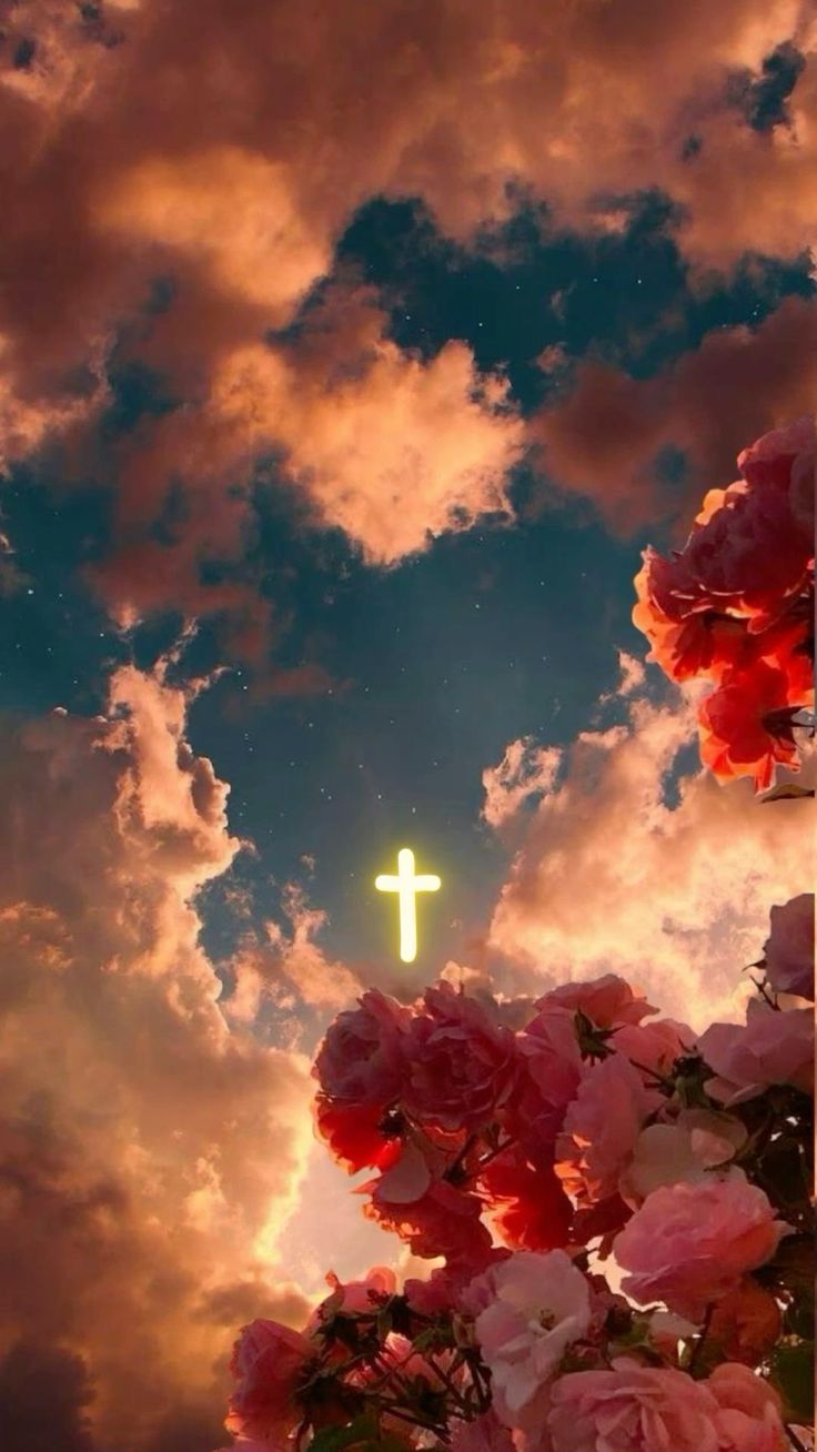 the sky is filled with clouds and pink flowers in front of a cross on top