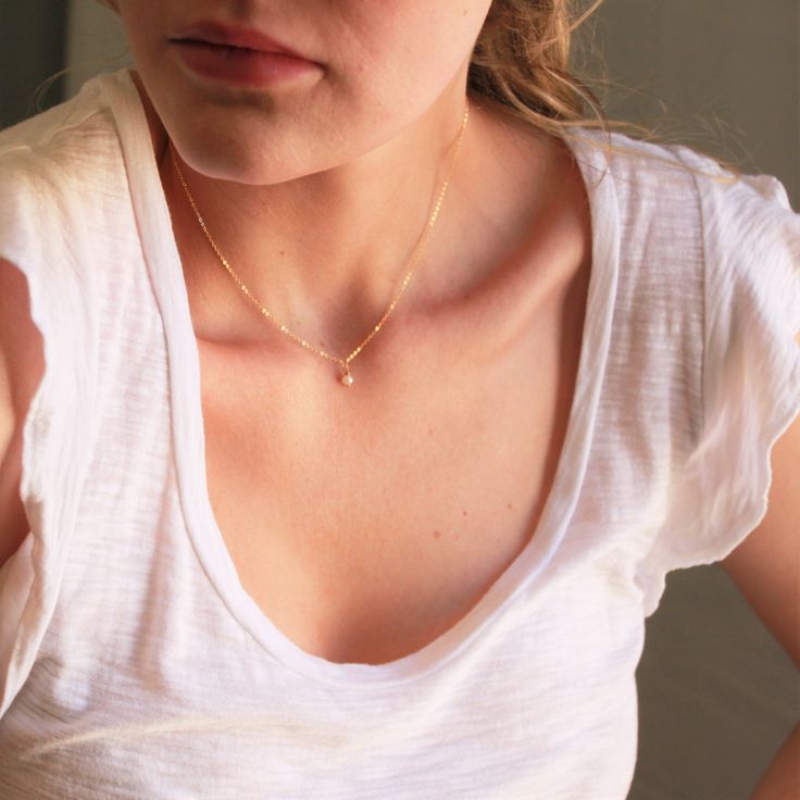 This gorgeous necklace is dainty enough for everyday, perfect for a special gift for birthdays or any occasion. -Tiny freshwater pearl hand wrapped -14kt gold filled delicate link chain - Model is wearing 16" in Photos. Simple Everyday Jewelry With Pearl Charm, Delicate Hypoallergenic 14k Gold-filled Necklace, Delicate Rose Gold Birthstone Necklace For Everyday, Dainty Pearl Charm Necklace For Everyday, Delicate Everyday Charm Necklaces, Minimalist Pearl Pendant Charm Necklace For Everyday, Dainty 14k Gold Filled Charm Necklace With Pearl Pendant, Dainty 14k Gold Filled Pearl Necklace For Everyday, Dainty 14k Gold Filled Charm Necklaces